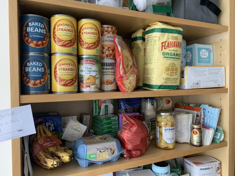 Help yourself to things on these shelves! Tins of beans, bags of rice and more!